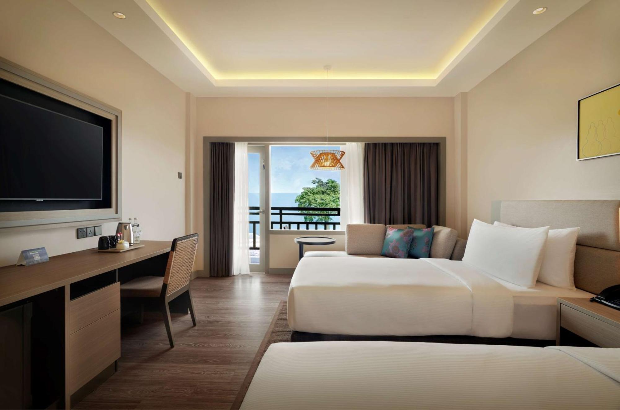 Готель Doubletree By Hilton Damai Laut Лумут Екстер'єр фото